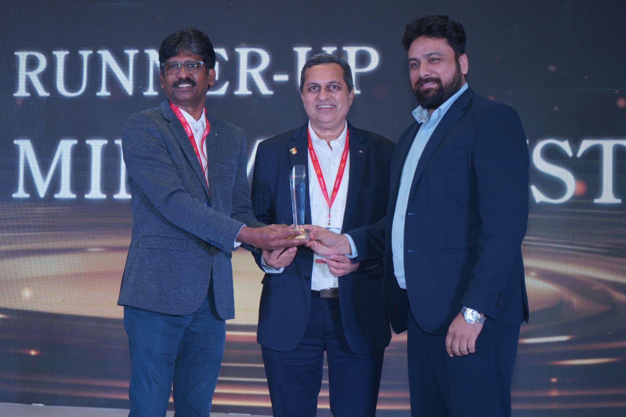 Minimac Systems receiving the Customer Service Excellence Runner-Up trophy at the Rosefield Awards 2025